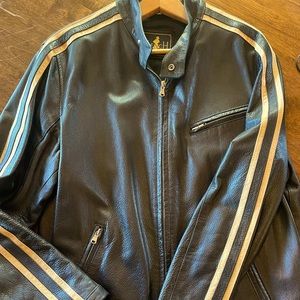 Black leather M/L textured leather motor jacket w/ sleeve stripes & zip cuffs